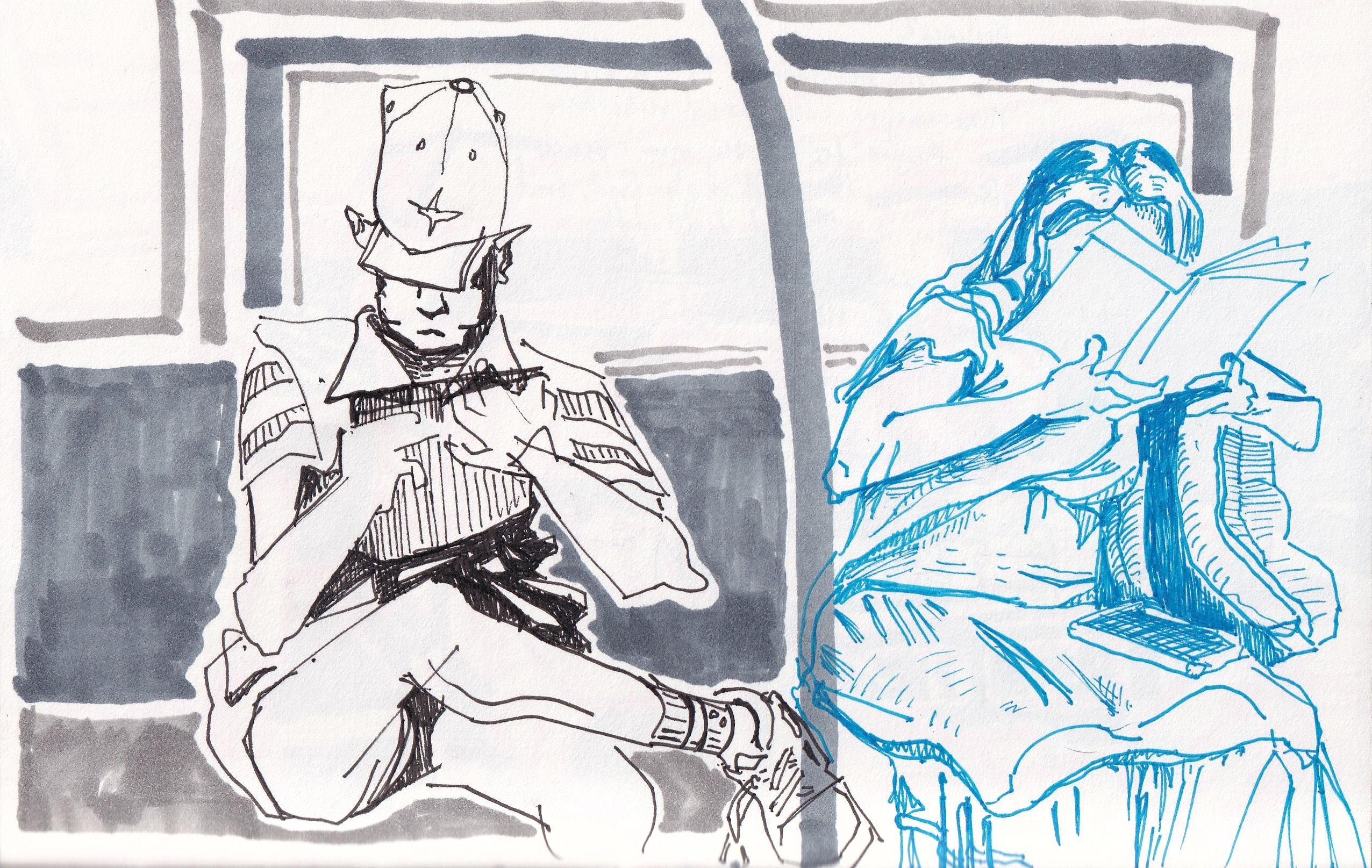 two people in a subway car